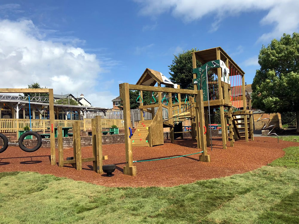Assorted play equipment installed in a play area